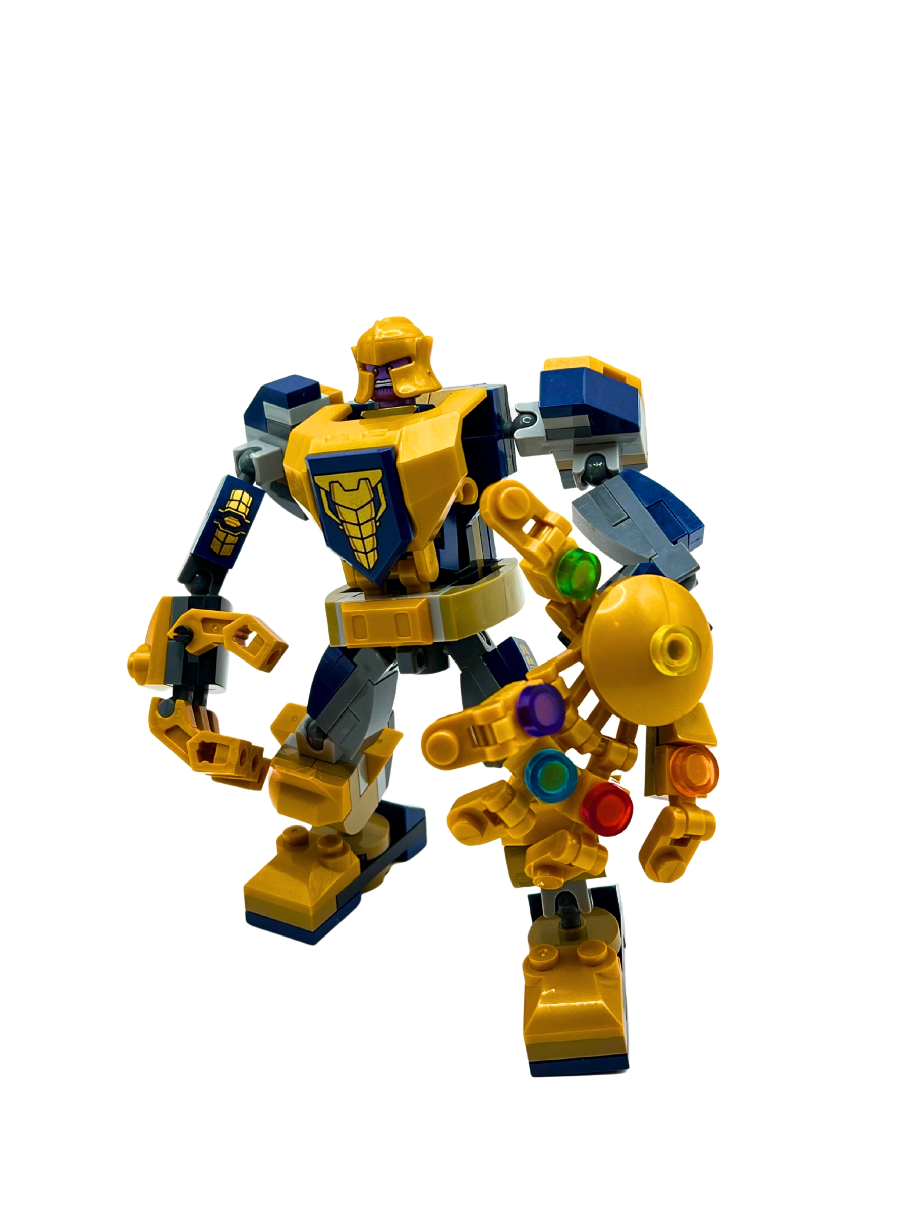 Thanos mech in gold with Infinity Gauntlet stones
